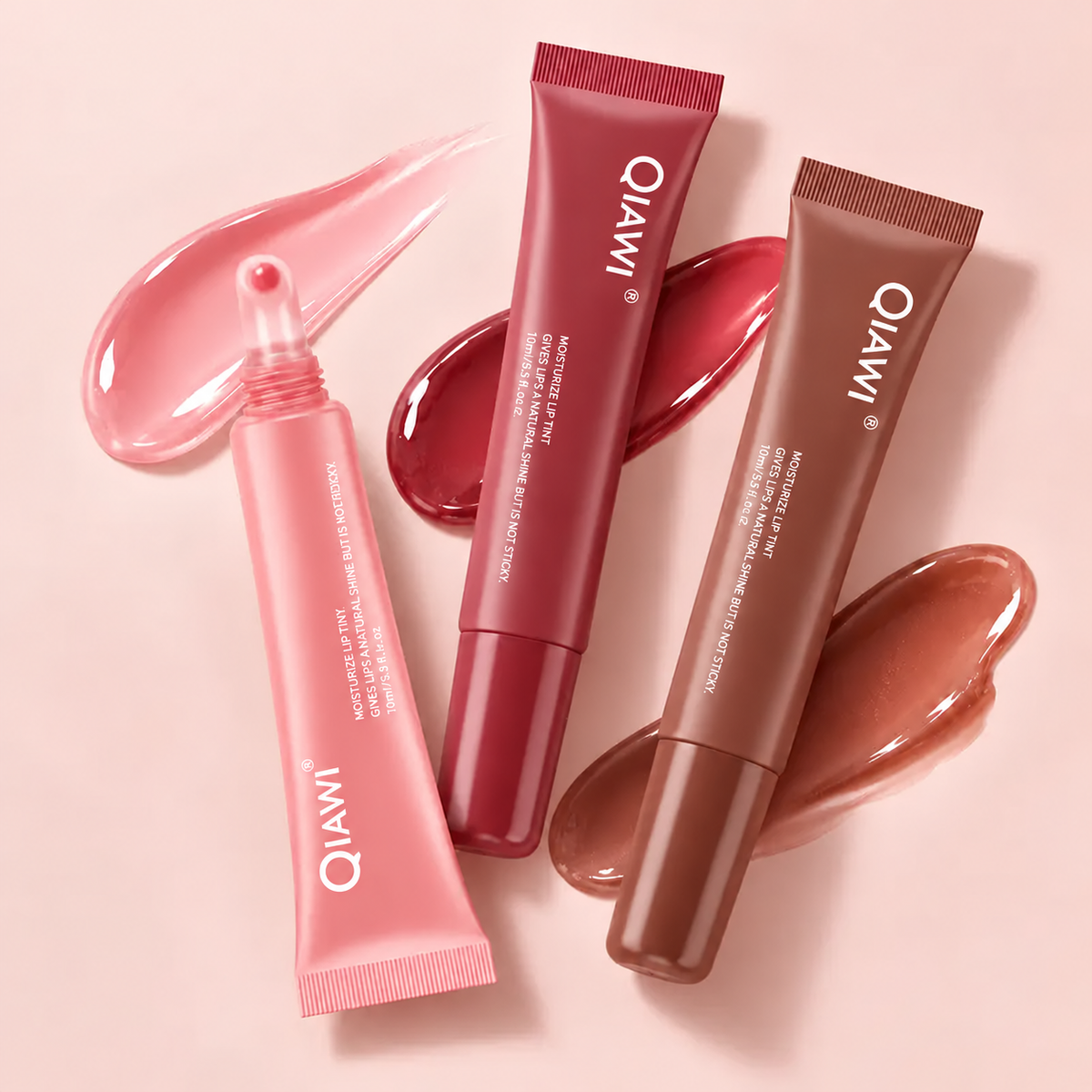 QIAWI pink berry and brown tubes with glossy texture swatches